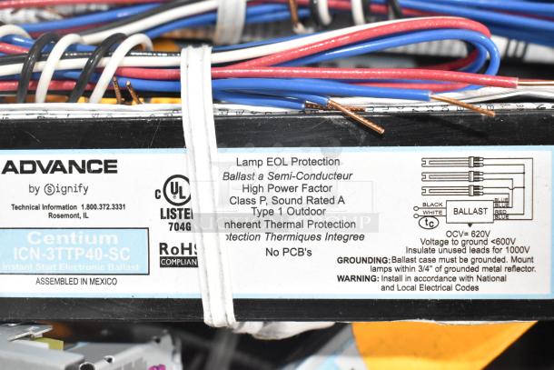 Lot of electronic ballasts, including Advance Centium ICN-3TTP40-SC model, new, UL-listed, RoHS compliant, wiring included.