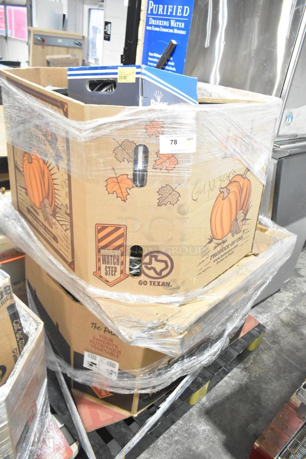 Pallet lot of various items, including boxed spools of wire, wrapped in plastic. Visible markings: "Go Texan," "Watch Step."