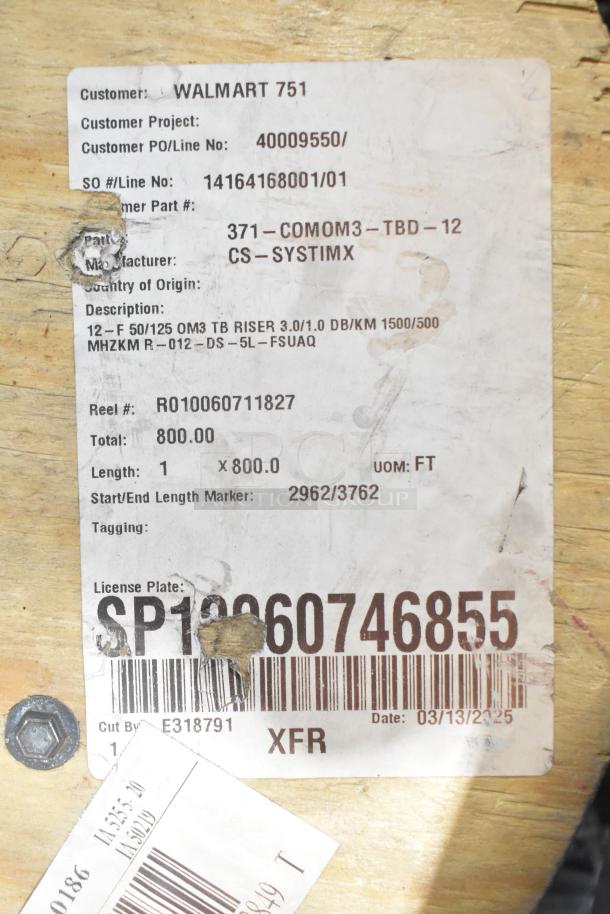 Pallet lot with spools of wire, label reads: "Walmart 751," "371-COM0M3-TBD-12," "800 ft length," "License: SP1060746855."