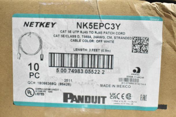 Panduit Netkey NK5EPC3Y Patch Cord box, 10 pieces, Cat 5E UTP RJ45, 3 feet, off-white, new condition, UL listed.