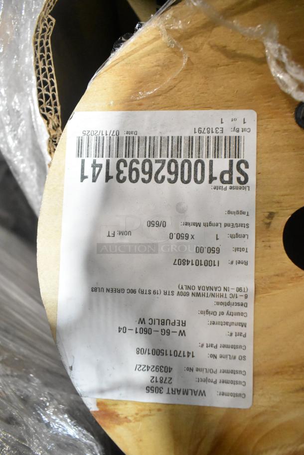 Auction label on a spooled item, marked with SP-1006293141, 650 ft, and various codes. Part of 18 brand new boxes.