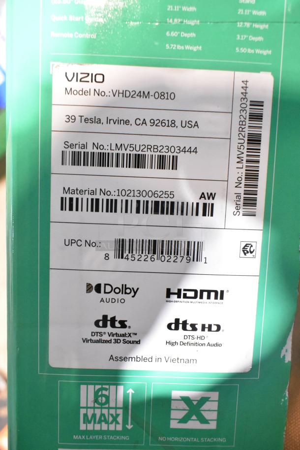 Original box with Vizio TV label, model VHD24M-0810, Dolby Audio, DTS, HDMI features noted, assembled in Vietnam.