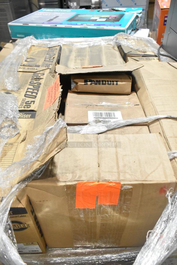 20 new items including Panduit Netkey NK5EPC7Y Patch Cord and GenSpeed 5e Series Cable in original boxes.