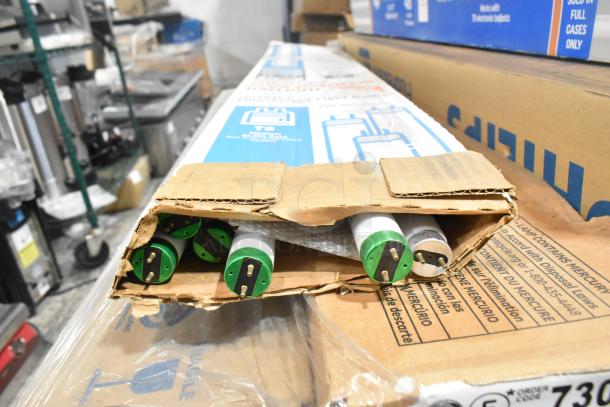 25 brand new tube lights including Philips fluorescent, GE T8 LED daylight, and Sylvania, in original packaging.