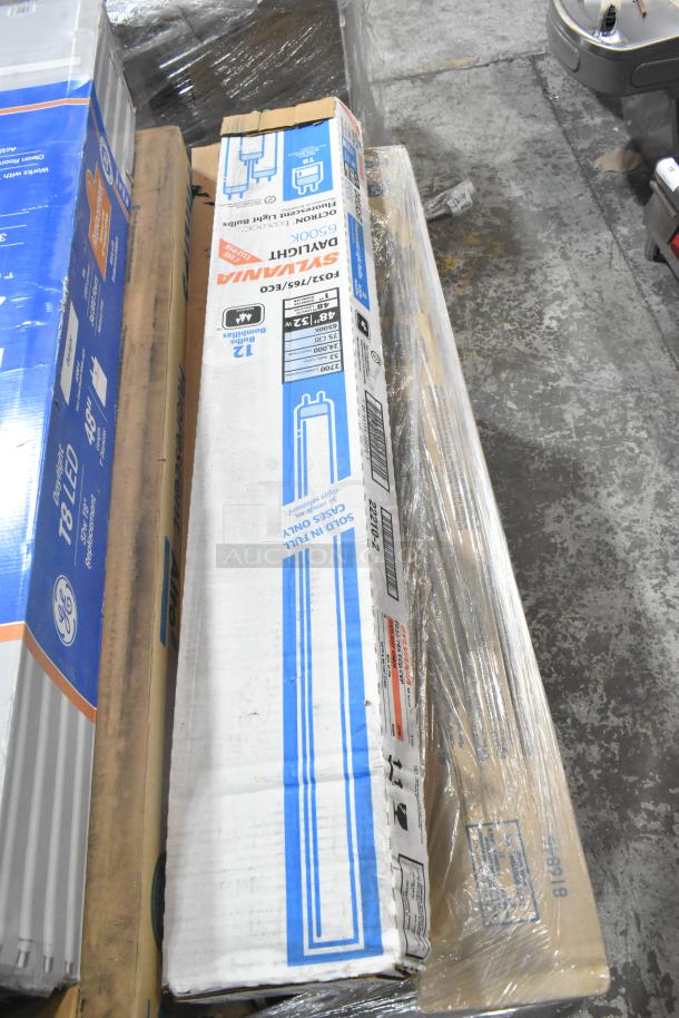 25 brand new lighting items including Philips fluorescent, GE T8 LED, and Sylvania tube lights in original packaging.