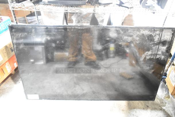 Samsung LH55DCE Television, 55-inch screen, visible wear, 100-240V, pick-up only, dust and smudges on display.