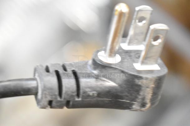 Close-up of a power plug compatible with Samsung LH55DCE television, 100-240 volts, 1 phase. Pick-up only.