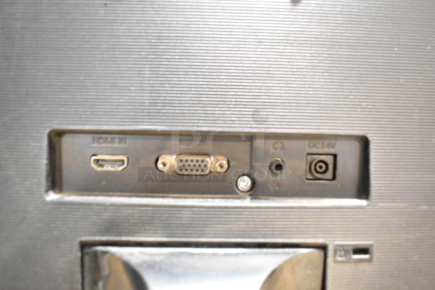 Ports on the back of a computer monitor include HDMI, VGA, audio jack, and DC 14V power input.