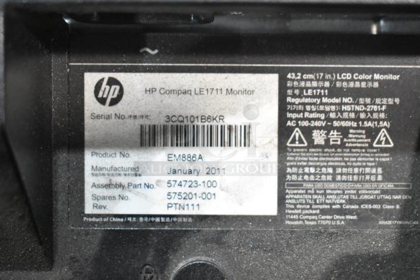 HP Compaq LE1711 Monitor label shows serial number 3CQ101B6KR, manufactured January 2011, model EM886A.