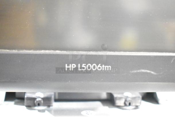 Set of 3 computer monitors including HP L5006tm. Condition shows minor wear. Ideal for multi-screen setups.