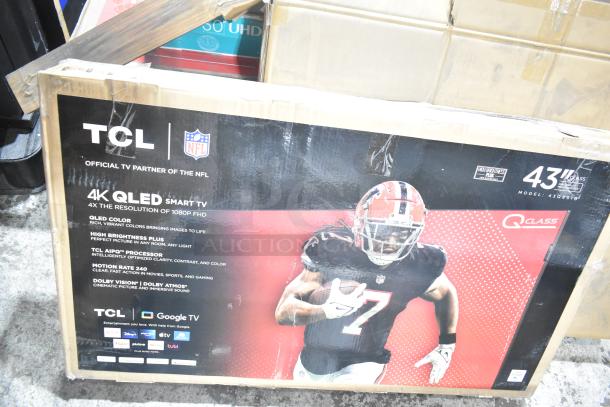 TCL 43" 4K QLED Smart TV in original box; model 43Q631G. Google TV, Dolby Vision, new condition. Auction includes Wren LED Monitor.