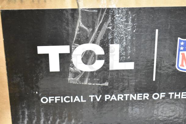 Original box with TCL 43" TV and Wren LED Monitor. Box marked "TCL Official TV Partner." New condition, sealed packaging.