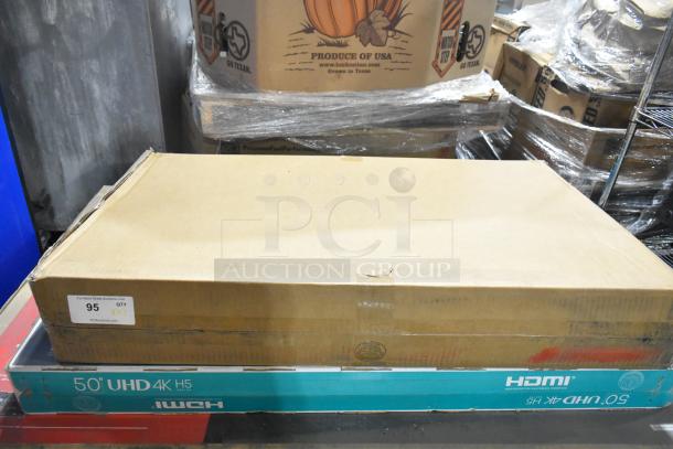 Hisense 50" UHD 4K Television and Wren LED Monitor in original boxes. New, unopened. Local pickup required.