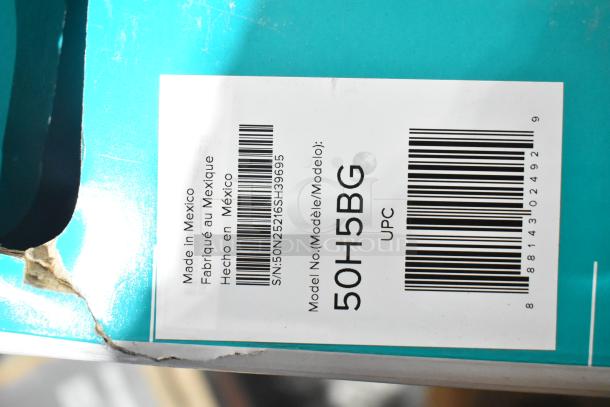 Hisense 50" UHD 4K TV model 50H5BG box label showing barcodes, made in Mexico, visible wear on packaging.