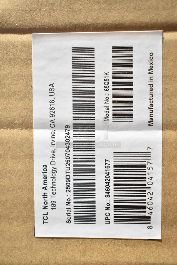 TCL 65" TV in original box, model 65Q51K. Serial: 2509DTU250704302479. Must pick up; not for shipping.