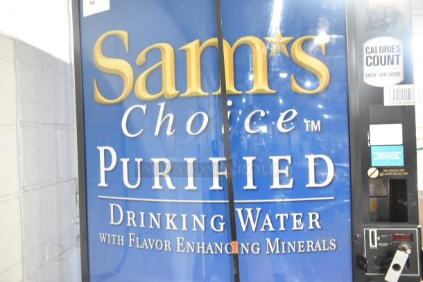 Royal RVCDE-768-10 metal commercial vending machine, 115 volts, 1 phase; "Sam's Choice Purified Drinking Water" branding visible.