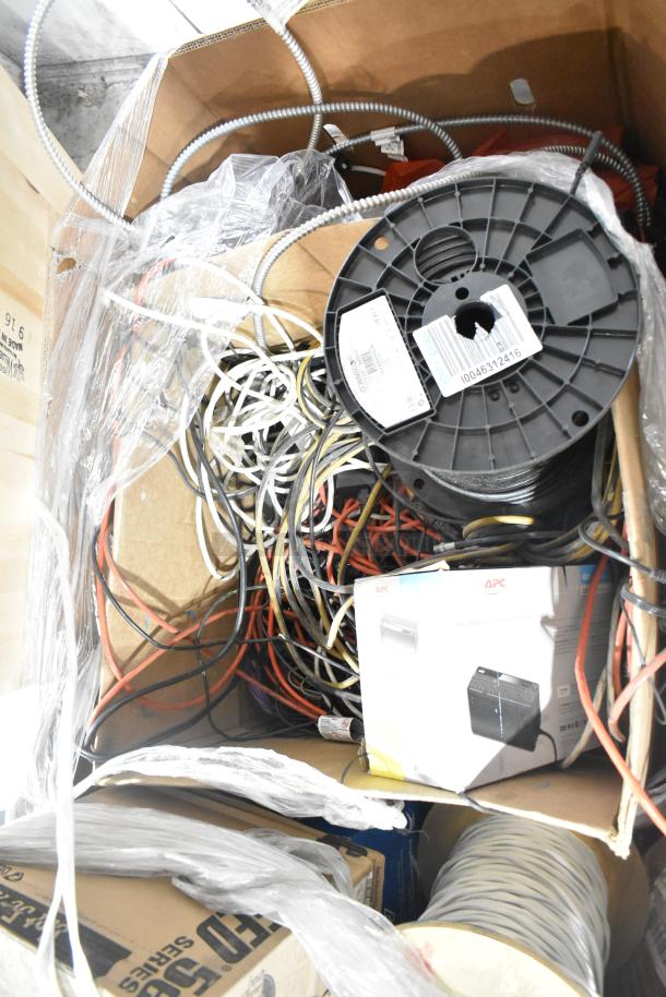 Box containing various cables, including Gen Speed and Paige Cable, plus a sealed 26" TFT LCD monitor box. Auction lot.