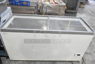 Vestfrost SCF1212DT chest freezer merchandiser, 115 volts, 1 phase, with glass sliding doors, used condition, some surface wear visible.