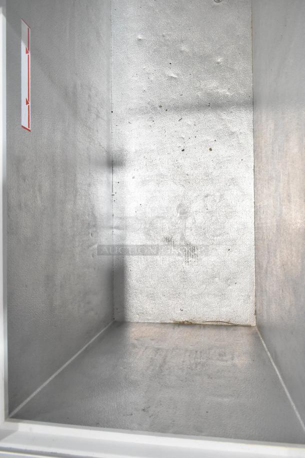 Vestfrost SCF1212DT chest freezer interior, showing clean metal surfaces. Equipped with 115V, 1 phase power.