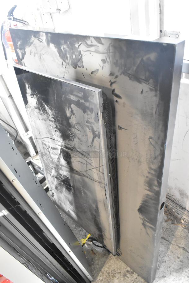 Samsung Luxfit LED Light Panel, black, used condition with visible scratches and smudges on the surface, no visible labels.