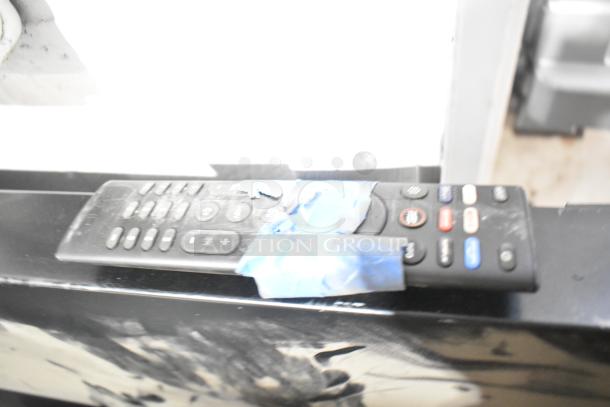 Samsung Luxfit LED Light Panel with remote, good condition, minor tape residue on remote.