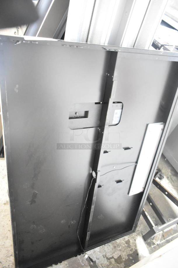 Samsung Luxfit LED Light Panel, large black panel, used condition, visible back wiring, no visible labels or markings.