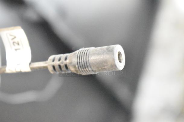 Samsung Luxfit LED Light Panel, close-up of connector with visible 12V label, in good condition.