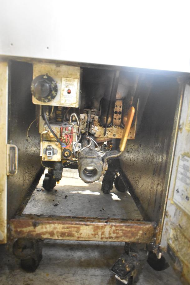 Pitco Frialator SB14RS stainless steel commercial deep fryer, natural gas, 122,000 BTU, with internal components visible.