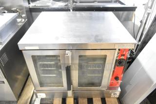 Vulcan VC6GE-SEFFCAM5 stainless steel commercial gas convection oven, view-through doors, metal racks, thermostatic controls.