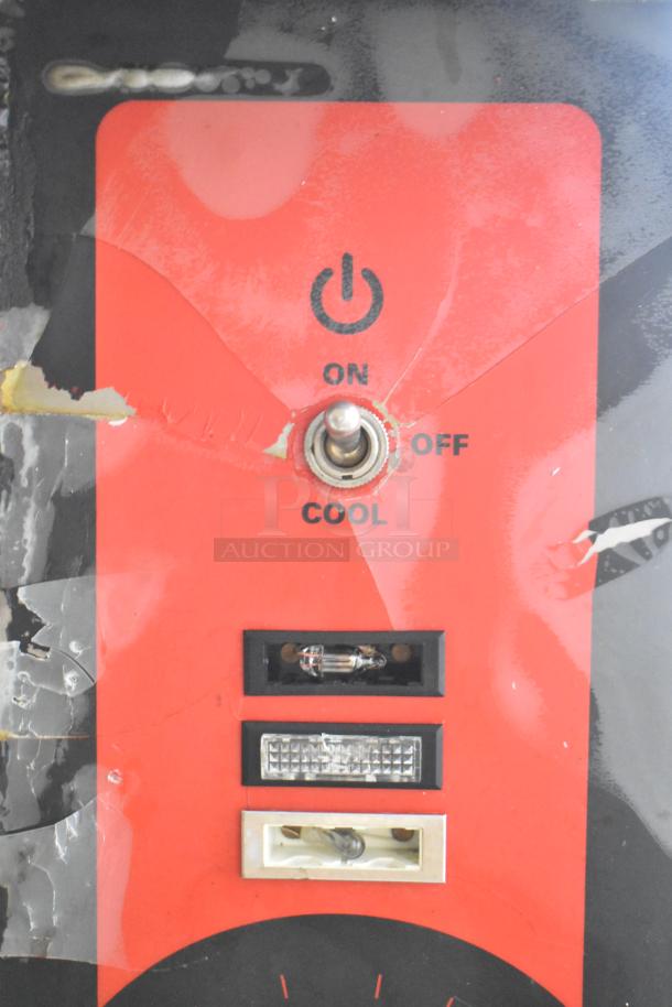 Control panel of Vulcan VC6GE-SEFFCAM5 commercial oven featuring on/off switch with visible wear, highlighting usage condition.