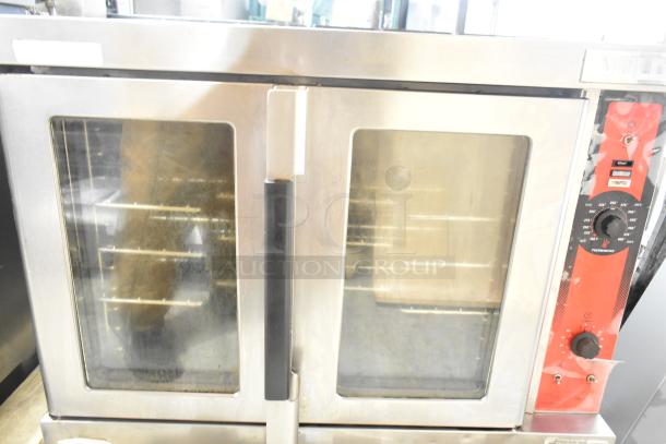 Vulcan VC6GE-SEFFCAM5 commercial convection oven, stainless steel, gas-powered, view-through doors, metal racks, thermostat controls.