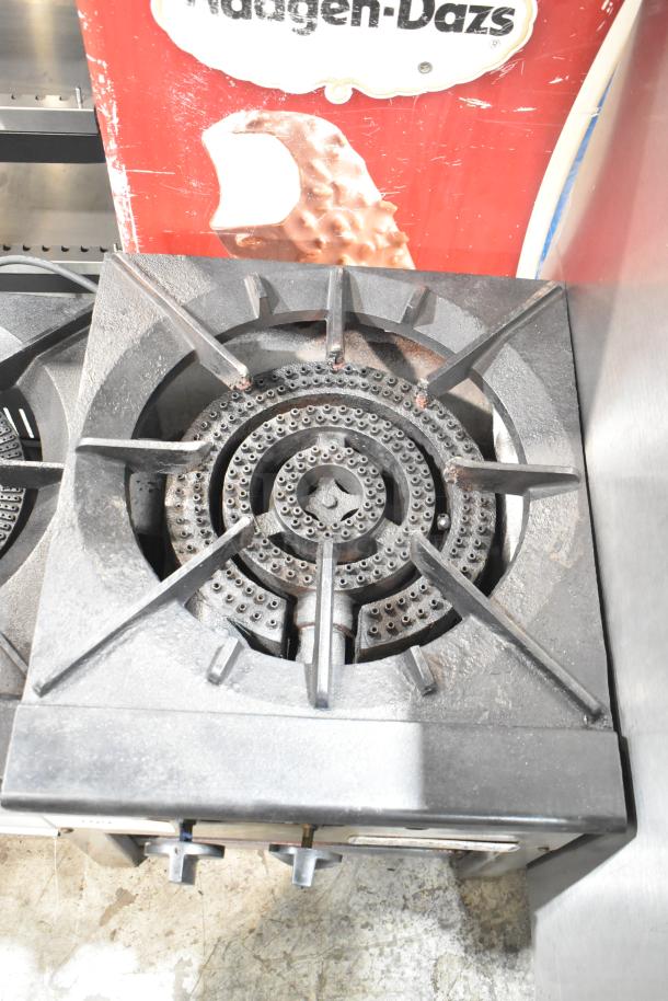 Radiance stainless steel commercial single burner stock pot range, gas-powered, clean condition, durable cast iron top.