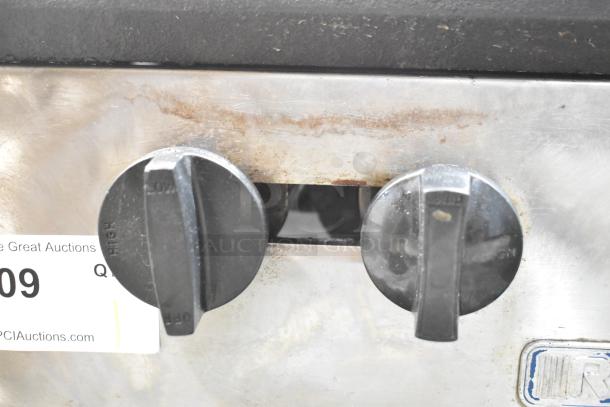 Radiance stainless steel single burner stock pot range with two control knobs labeled "Low" and "High." Slight surface wear.