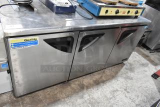 Turbo Air stainless steel 3-door undercounter cooler, 115V, 1 phase, commercial-grade. Warranty labels visible.