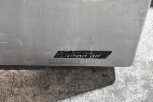 Turbo Air stainless steel 3-door undercounter cooler, 115V, 1 phase. Visible Turbo Air logo. Used condition.