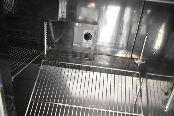 Turbo Air 3 Door Undercounter Cooler, stainless steel interior, adjustable shelves, 115V, 1 Phase, commercial use.