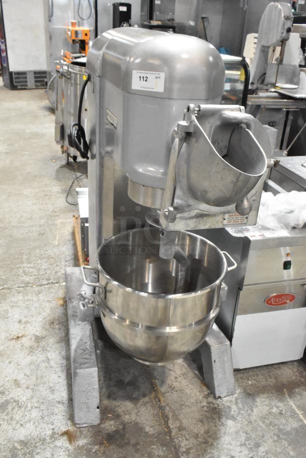 Hobart H-600 commercial dough mixer with pelican head, mixing bowl, and dough hook. Metal finish, 60 qt, 115/240V, 3 phase.