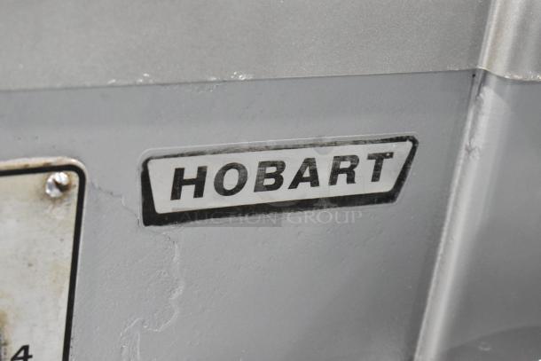 Hobart H-600 commercial dough mixer, 60-quart, with pelican head, mixing bowl, dough hook. 115/240V, 3-phase. Marked "Hobart."