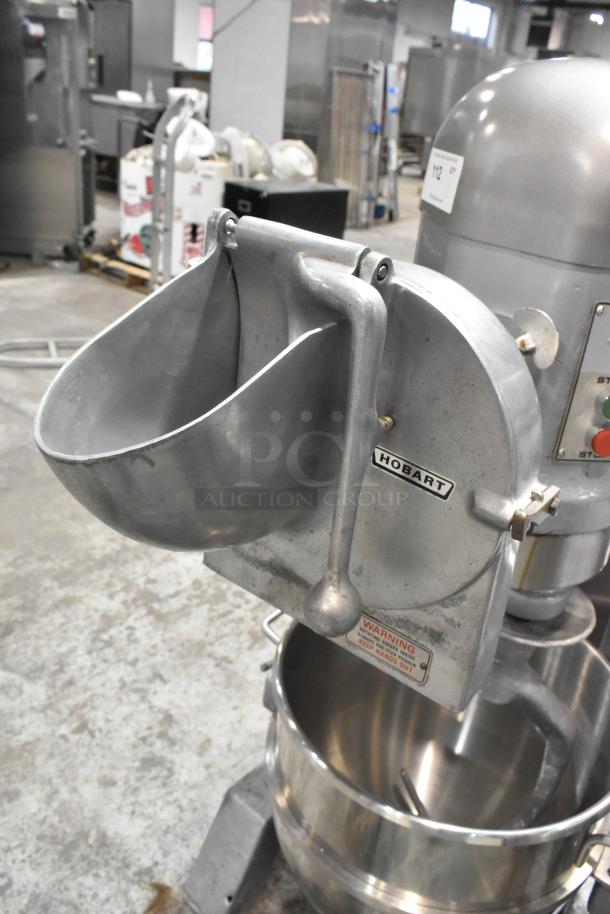 Hobart H-600 commercial 60 qt mixer with pelican head, mixing bowl, and dough hook. Metal, 115/240V, 3-phase. Model H-600.