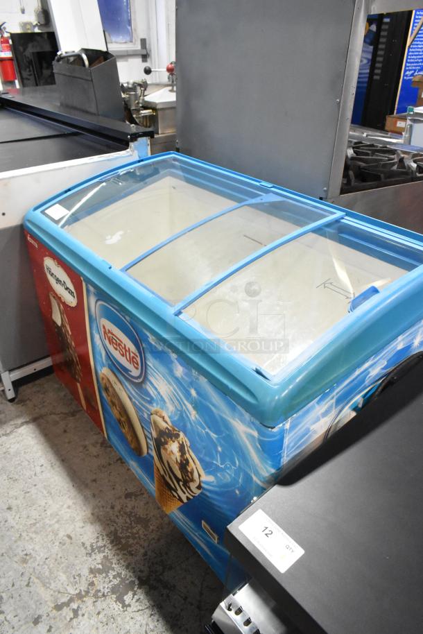 AHT commercial freezer merchandiser, metal construction on casters, 115V, 1 phase, branded graphics, clear sliding lid.