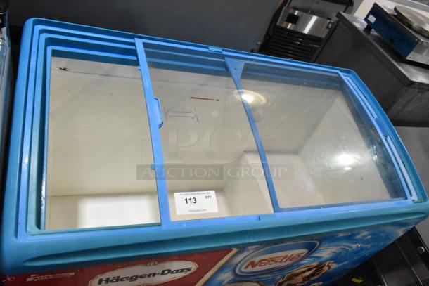 AHT Metal Commercial Floor Freezer Merchandiser with glass sliding doors, on commercial casters, 115V, 1 Phase.