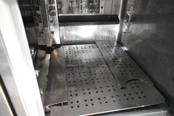 2023 ISA Tavola Fredda stainless steel commercial prep unit, lower refrigeration, 230 volts. Clean interior with perforated shelving.