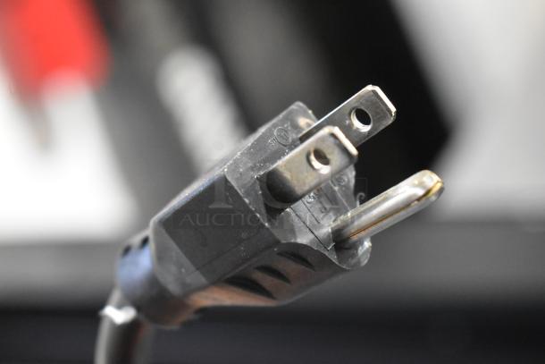 2023 ISA Tavola Fredda Stainless Steel Commercial Prep Unit plug, 230V. Close-up view of the power plug and its prongs.