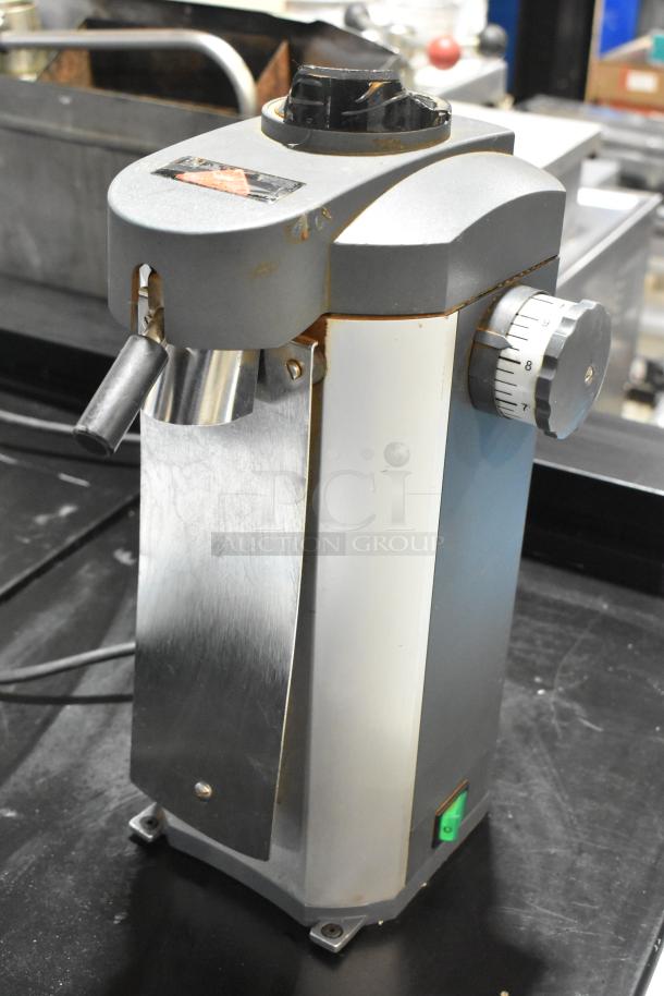 Mahlkonig Tanzania Grau commercial espresso grinder, metal body, no hopper, 120V, 1 phase, visible wear, adjustable dial.