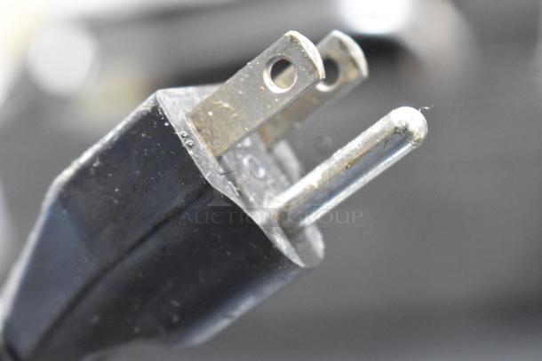 Close-up of a plug for Mahlkonig Tanzania Grau Metal Commercial Espresso Bean Grinder. 120 volts, 1 phase, no hopper.