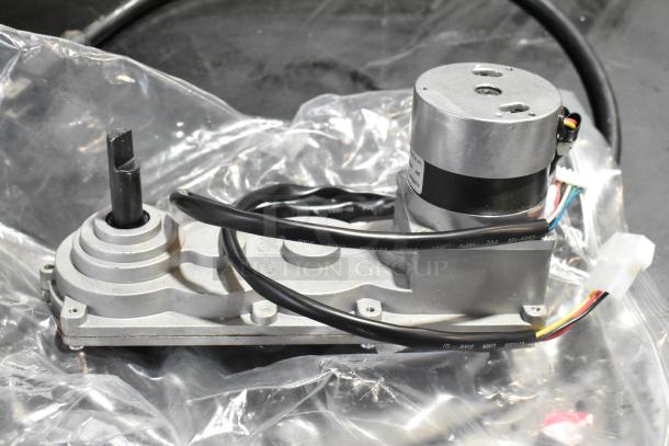 Galaxy 177PGSM412 condenser fan motor for 2 and 3 bowl slushy machines, brand new condition, with attached wiring and connectors.