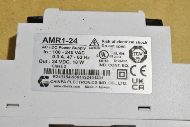 AMR1-24 AC/DC power supply label, 100-240 VAC, 24 VDC, 10W, Class 2. Chinfa Electronics, Taiwan, with safety certifications.