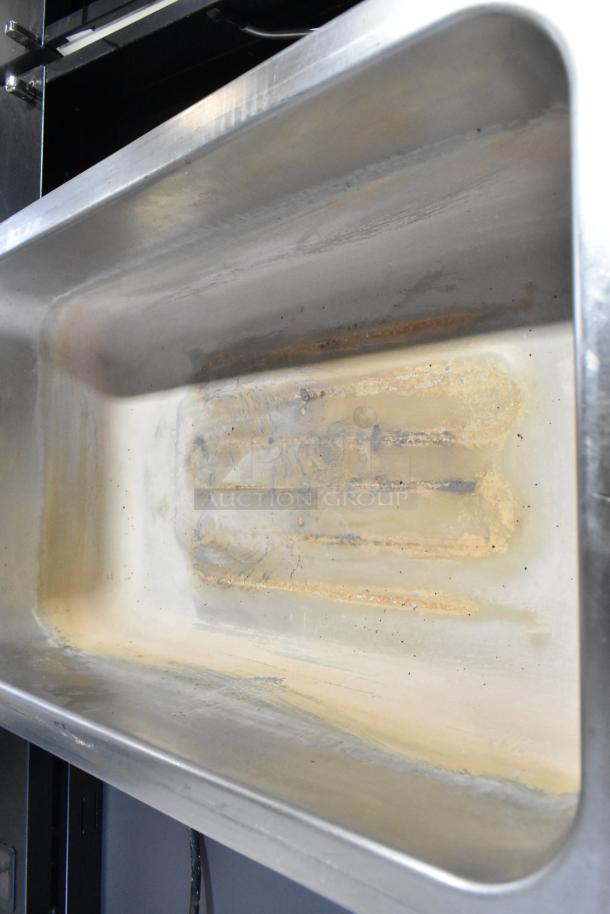 2023 Avantco 177W50CKR Stainless Steel Commercial Food Warmer, visible wear. 120V, 1 Phase. Interior shows signs of use.