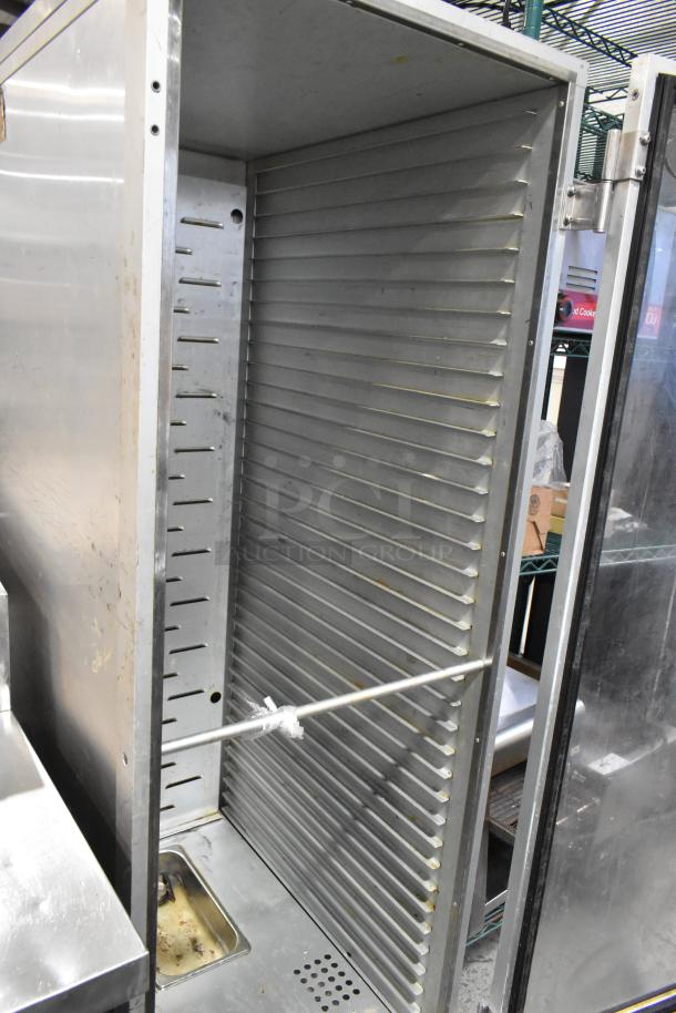 2018 Bevles HPIC-6836 heated holding cabinet in metal, open door, interior shelving, on commercial casters, 120 volts, 1 phase.