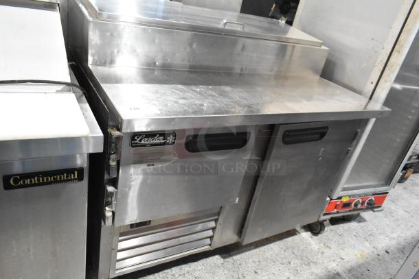 2021 Leader ESPT48 stainless steel commercial pizza prep table, with commercial casters, 115 volts, 1 phase.